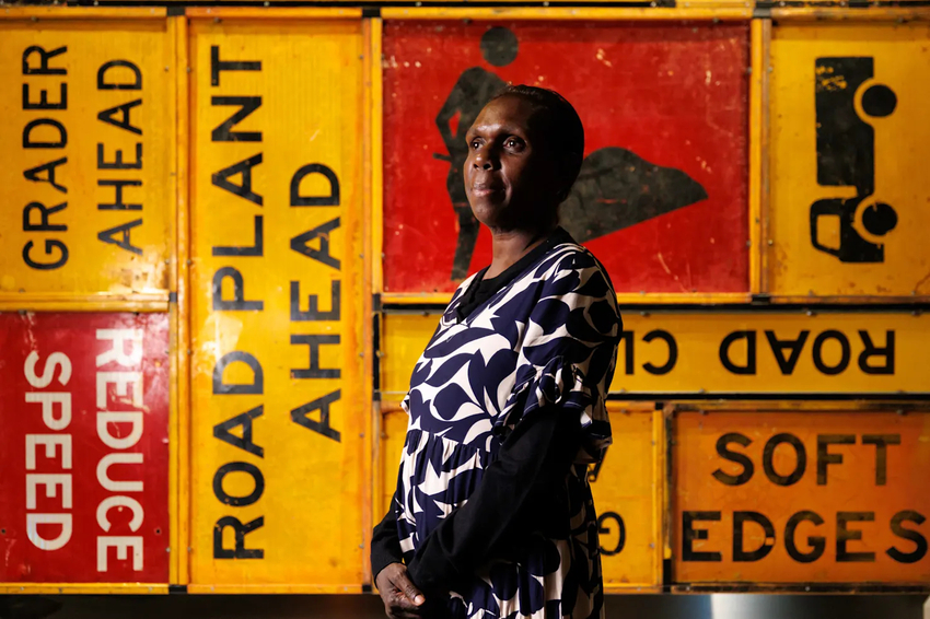 Gaypalani Wanambi at the Museum and Art Gallery of the Northern Territory, Darwin, in front of her work Burwu, blossom, 2025
