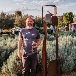 Paul Bacon with his steel sculpture Wren Temple